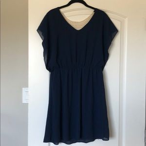 Navy blue dress with cream crochet back detail